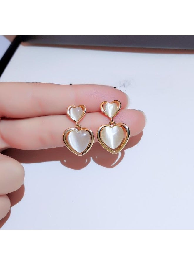 أقراط نسائية فريدة وأنيقة من الفضة بتصميم إبرة، مناسبة للارتداء اليومي أو المناسبات الرسمية